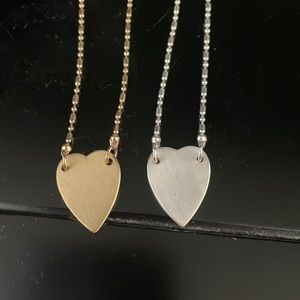 2 heart necklaces